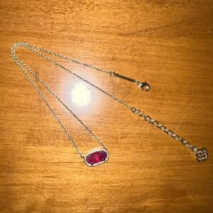 Kendra Scott Elisa necklace. Ruby/red colored stone and gold chain